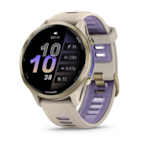 Смарт-годинник Garmin Forerunner 970 із золотистим титановим безелем, сірим корпусом і ремінцем кольору французький сірий/індиго